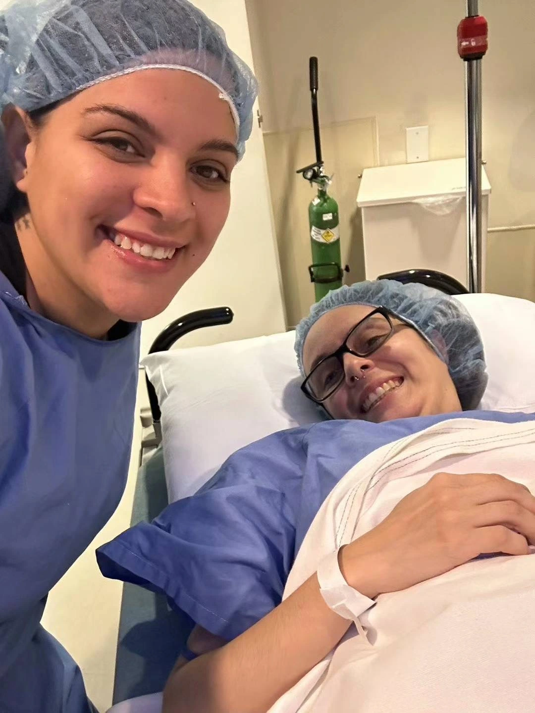 A surrogate with members of her care team