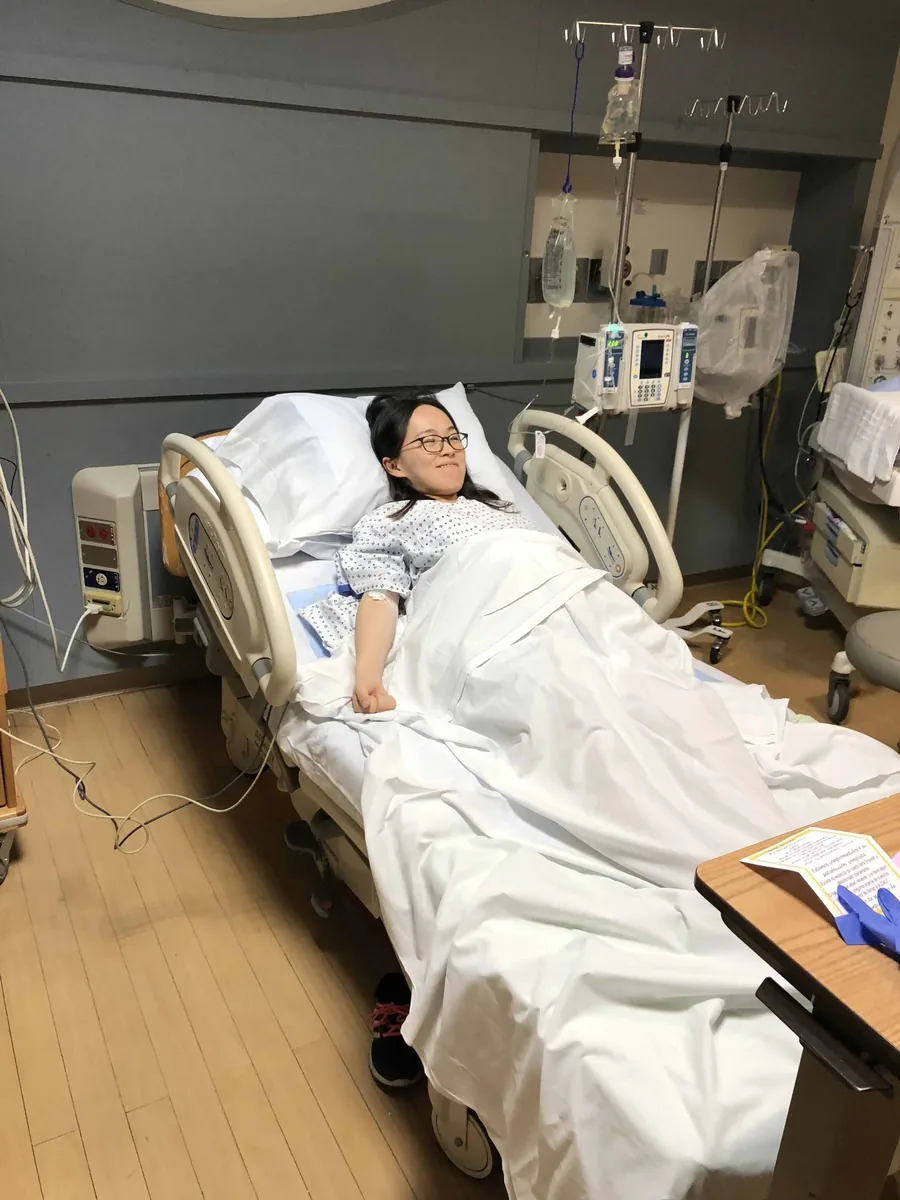 Surrogate recovering after delivery with postpartum support
