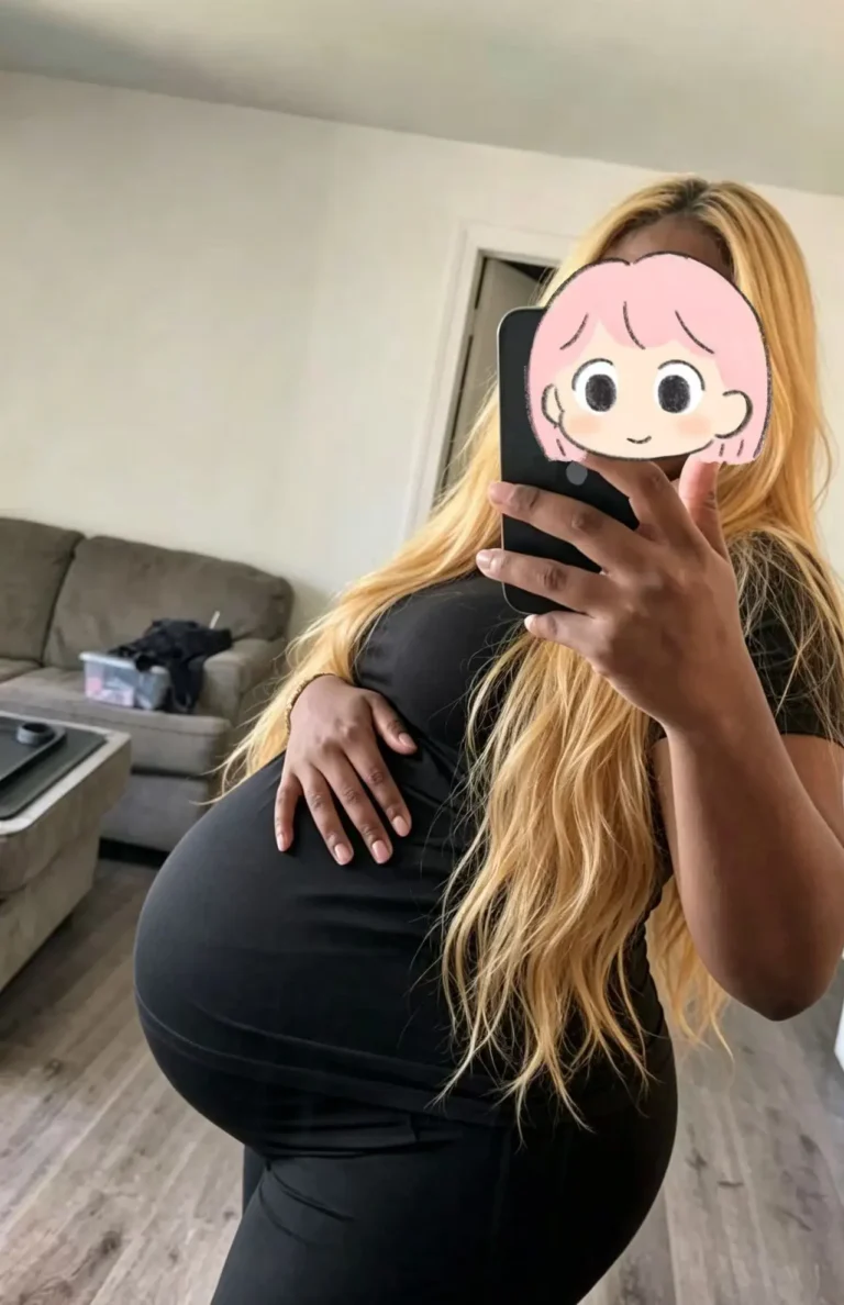 Pregnant surrogate marking a journey milestone