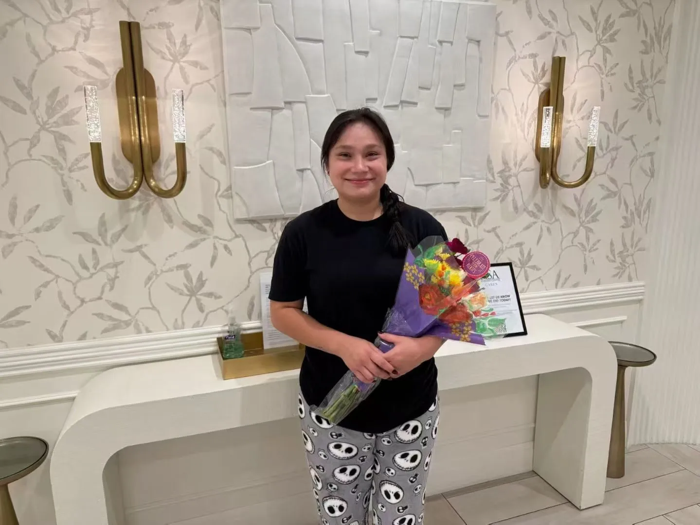 A surrogate celebrating a successful milestone with flowers