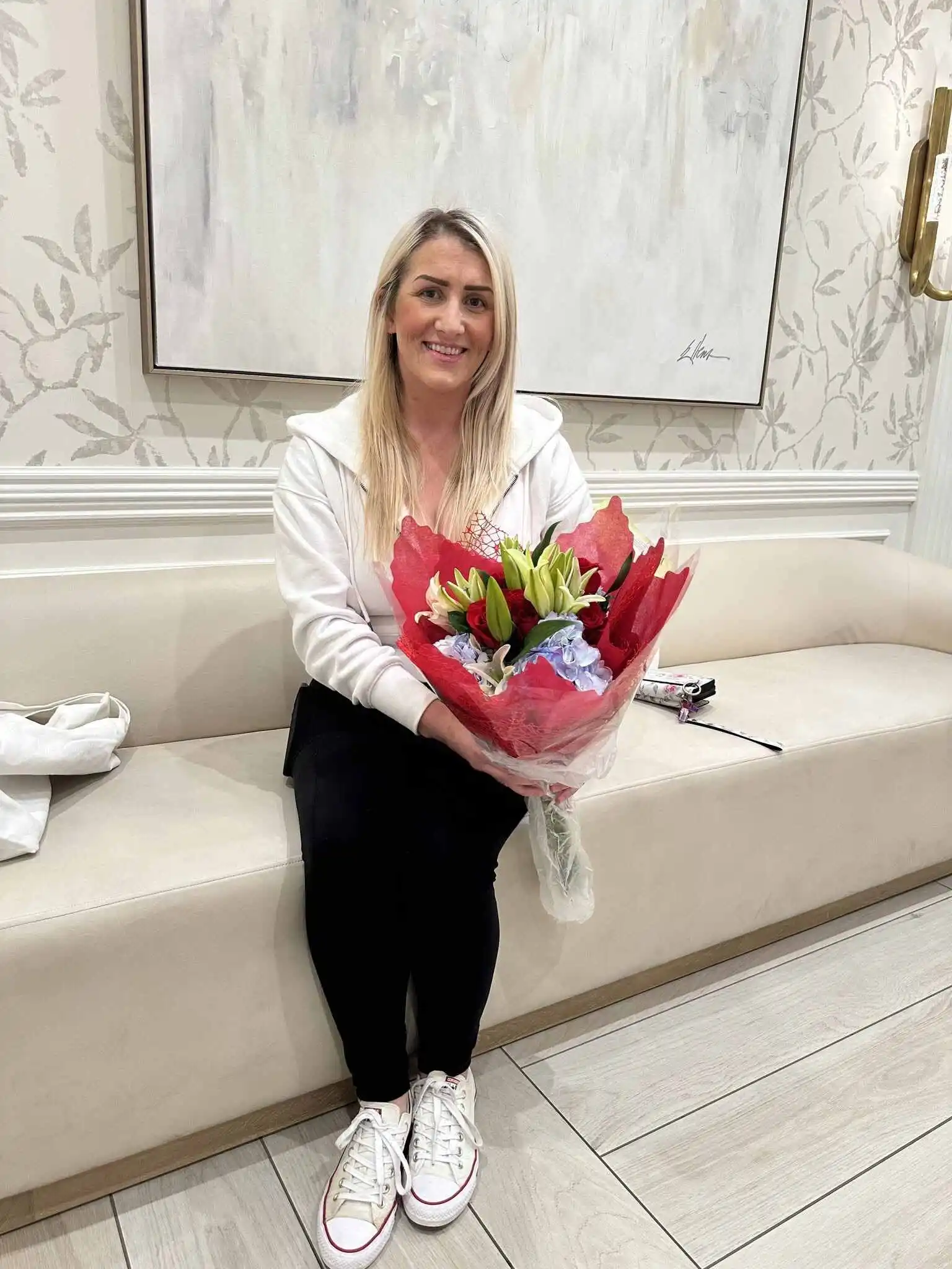 A surrogate celebrating a successful compensated journey milestone