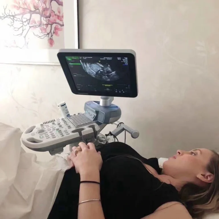 Surrogate attending an ultrasound appointment during a busy month