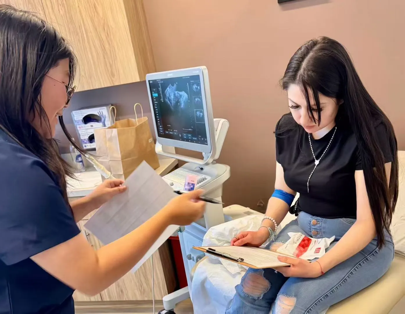 A surrogate completing an ultrasound health evaluation
