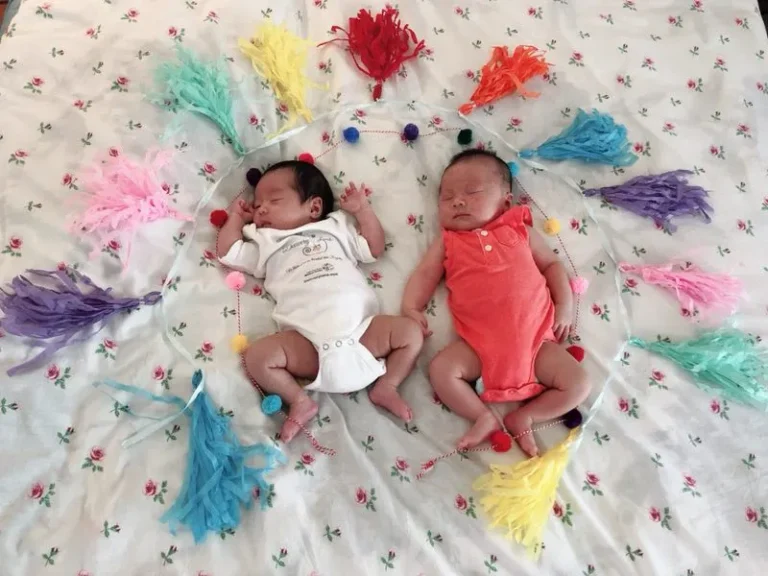 Twin newborns photographed after birth